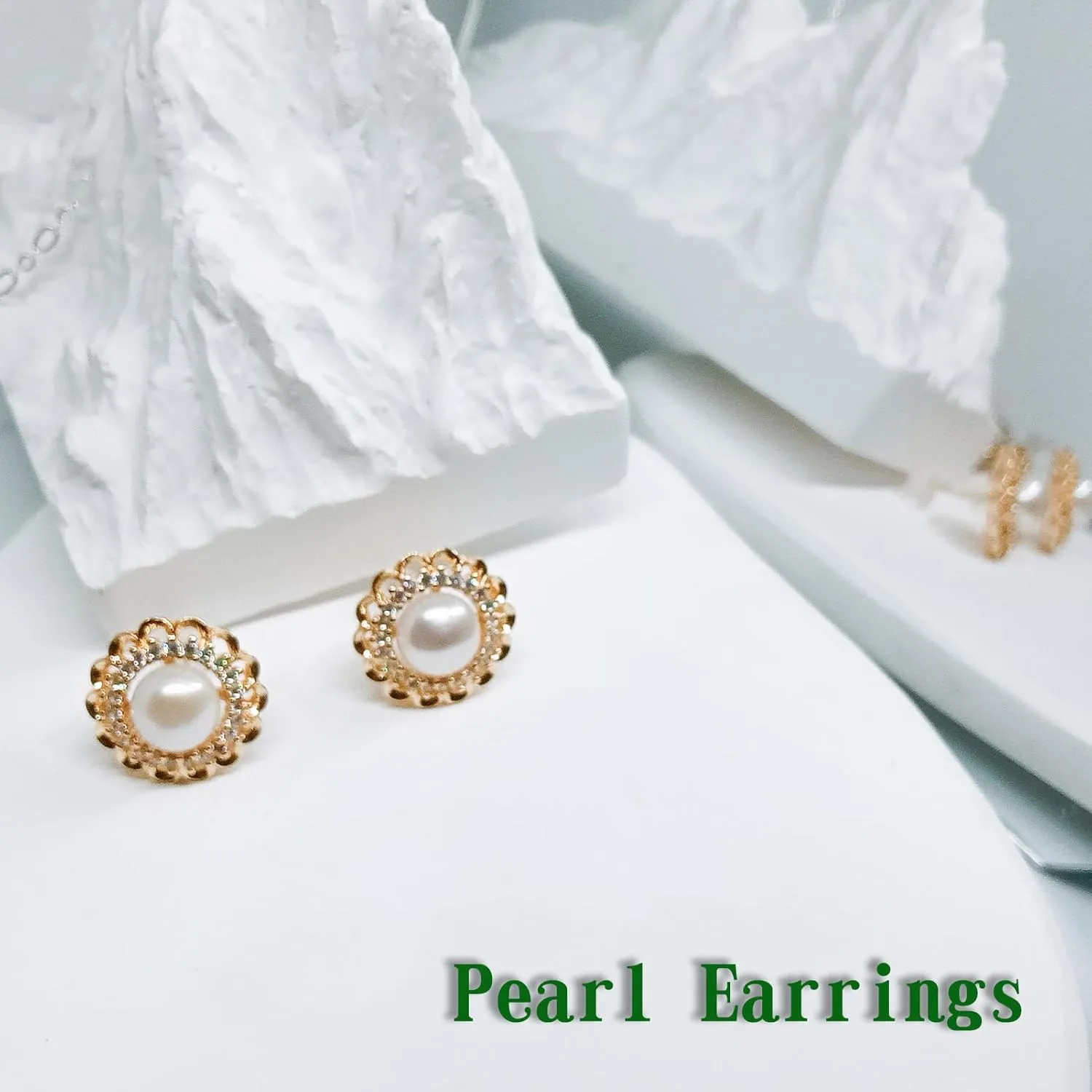 pearl dangle earrings for women, diverse styles of gold and silver pearl studs, chic dangling earrings, trendy dangle earrings for women, unique pearl dangle earrings, stylish earrings