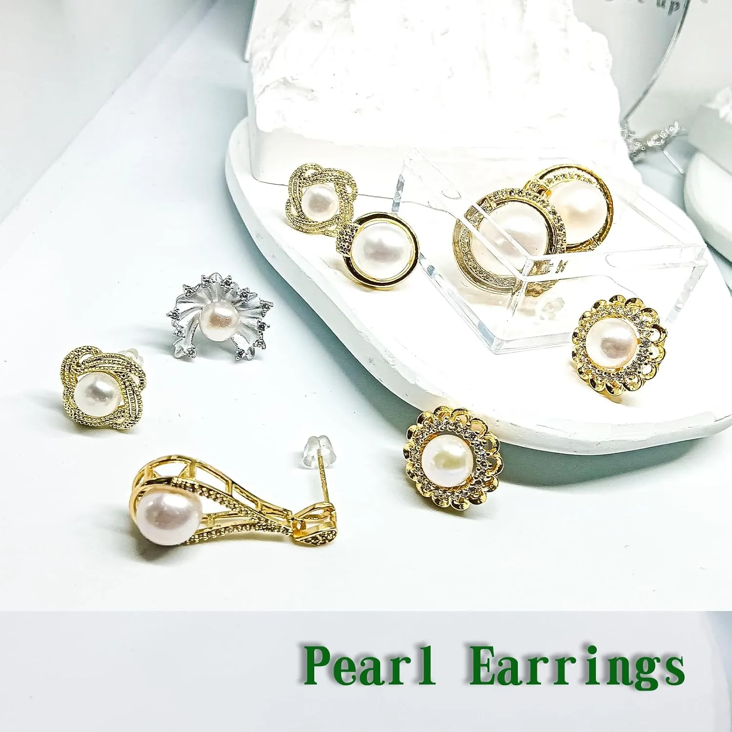 pearl dangle earrings for women, diverse styles of gold and silver pearl studs, chic dangling earrings, trendy dangle earrings for women, unique pearl dangle earrings, stylish earrings
